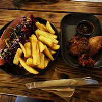 Korean slaw dog and Indian starter of samosa, pakora, and onion bhaji at Super Natural Newcastle in Newcastle Upon Tyne