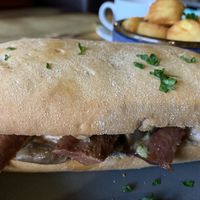 Sausage, bacon & mushroom sandwich  at Super Natural Newcastle in Newcastle Upon Tyne