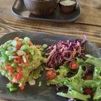 Avocado on toast and breaded garlic mushrooms at Super Natural Newcastle in Newcastle Upon Tyne