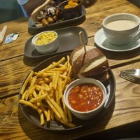 Pretzel brunch burger again ^^ and the sausage mushroom and bacon roll. With a side of scrambled tofu ❤️❤️❤️ at Super Natural Newcastle in Newcastle Upon Tyne