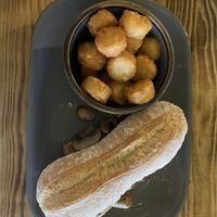 Vegan sausage, bacon and mushroom sandwich  at Super Natural Newcastle in Newcastle Upon Tyne