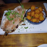 Mushroom, sausage and facon roll. Such a great breakfast sandwich. at Super Natural Newcastle in Newcastle Upon Tyne