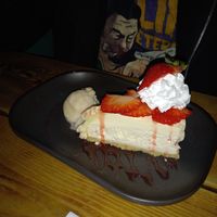 Cheezecake with Ice Cream & Strawberries. at Super Natural Newcastle in Newcastle Upon Tyne