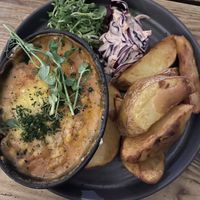 Mushroom & aubergine lasagne with hand-cut chips  at Super Natural Newcastle in Newcastle Upon Tyne
