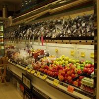 Fresh produce case. Local items are labeled as such. at Nature's Pantry in State College