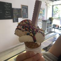 Golden syrup and Biscoff ice cream with chocolate sauce, rainbow sprinkles and a pink wafer  at Ice Shack in Manchester