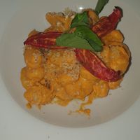 Exquisito Gnocchi de quinoa con pesto siciliano at Gioia Plant-Based Cuisine in Marbella