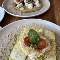 Mushroom and jackfruit gyros, and raw zucchini lasagne   at Gioia Plant-Based Cuisine in Marbella