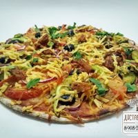 Classic pizza at Kukhnya Zdravogo Smisla in Veliky Novgorod