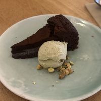 Chocolate cake with pistachio ice creamm  at The Green Spot in Barcelona