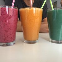 Berry smoothie, ginger and orange juice, spirulina smoothie at Rawdia in Brasov