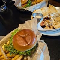 Vegan burger in front, impossible burger in back, hummice with pita on middle at Skagway Brewing Co. in Skagway