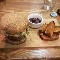 The Boss Burger with sweet potatoe fries and beetroot sauce at Evergreen Organics in Doha
