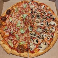 Follow Your Heart vegan cheese, artichoke hearts, and mushrooms at Rovente Pizzeria - East Side in Portland