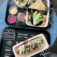 Breakfast sandwich and Mac and cheese (top) meatball sub (bottom) at By Chloe in Los Angeles