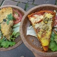 potato pie & polenta pizza at Zaziv Vegan Bistro in Ljubljana