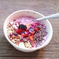 Cereals & strawberries bowl at Coco Bowls in Warsaw