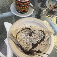 Vegan Crêpe with dark chocolate and brown chai latte with oat milk  at Joya Canti di Stagione in Polignano A Mare