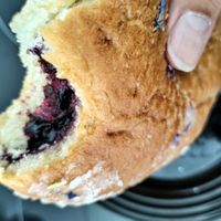 Fried dough filled with fruit jam, very big and super tasty. at Zemsta in Poznan