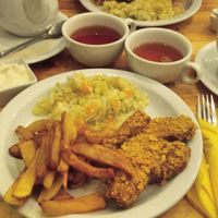 tempeh fried, fries and salad at Zemsta in Poznan