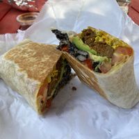 Jameys Burrito with vegan sausage  at Roots Cafe in Brooklyn