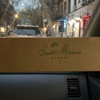 stamped logo on vegan macaron box.   at Confectionery! in New York City