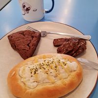 Cheese and onion bread plus chocolate scone.. at Haemil Bakery in Seoul