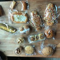 Our collection of baked goods. We were on the go the next few days of our trip, and it actually kept well for about 2 days. We ate the refrigerated/ones with cream in them first. at Haemil Bakery in Seoul
