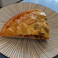 Vegan pizza slice at Haemil Bakery in Seoul