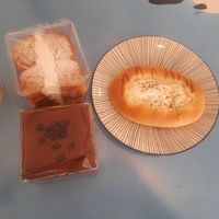 Cream bread, chocolate castella and onion bread at Haemil Bakery in Seoul