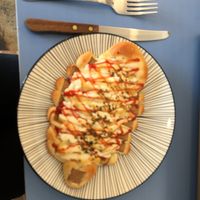 Pizza bread with ham and cheese at Haemil Bakery in Seoul