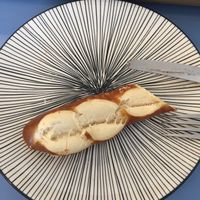 Half a pretzel stick the owner gave at Haemil Bakery in Seoul