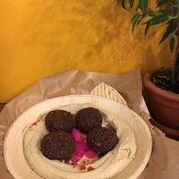 hummus with falafels  at Mango Vegan Street Food - Zlota in Warsaw