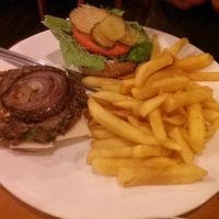 Black bean burger with fries..very bland. at TVJ Kitchen - West LA in Los Angeles