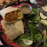 Vegan Buffalo wrap this was so cheesy really good And even the salad was great the dressing had good flavor at The Green Fork & Local Roots Market in North Wales