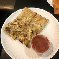Cheesy strips with pizza sauce at Screamer's Pizzeria - Greenpoint in Brooklyn