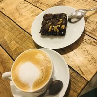 Brownie and coffee with rice milk at Xícara Tenda in Santiago De Compostela