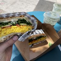 Breakfast sandwich, normally served on a croissant, but the ciabatta was also 🤤  at Glowing Plant Based Eatery in Los Angeles