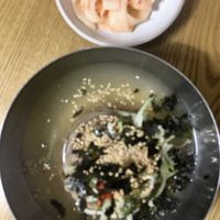 Apologies for the blurriness. This is the mul makguksu without egg with the vegan pickled radish on the side.  at DunNae MakGukSu in Busan