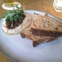 Artichoke dip with olives and sourdough at Meatless District - Da Costabuurt in Amsterdam
