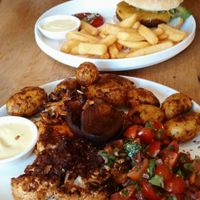 Cauliflower steak + cheeseburger at Meatless District at Meatless District - Da Costabuurt in Amsterdam