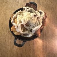 Smashed potato with ‘cheese’ sauce and ‘parmesan'  at Meatless District - Da Costabuurt in Amsterdam