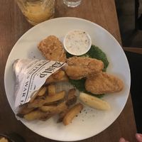 The “Fish and Chips”: just three defrosted Gardein fish filets, some french fries, and mashed peas at Meatless District - Da Costabuurt in Amsterdam