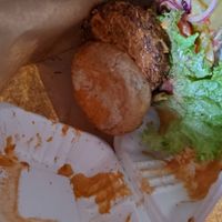 Disgusting. Asked for takeaway and no mayo or sauce. Get back to hotel and ... this disgusting sauced up mess. They couldn't accommodate curry takeaway.  Waste of money at Meatless District - Da Costabuurt in Amsterdam