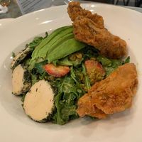 Summer salad with wings at Sticky Fingers Diner in Washington