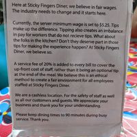 Service fee note at Sticky Fingers Diner in Washington