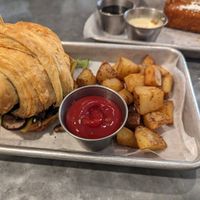 Croissant sandwich with home fries-- meh at Sticky Fingers Diner in Washington