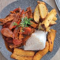 Lomo saltado con platano frito at Sattva by Govinda in Aguas Calientes