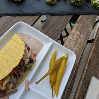 Taco filled with beans and veg and served with pickled chilli and mayonnaise at Bistraw Zdravo Zivo in Skopje