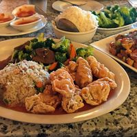 Vegan sweet and sour chicken steamed rice spring roll and broccoli beef at Yuan Su Vegetarian in Portland